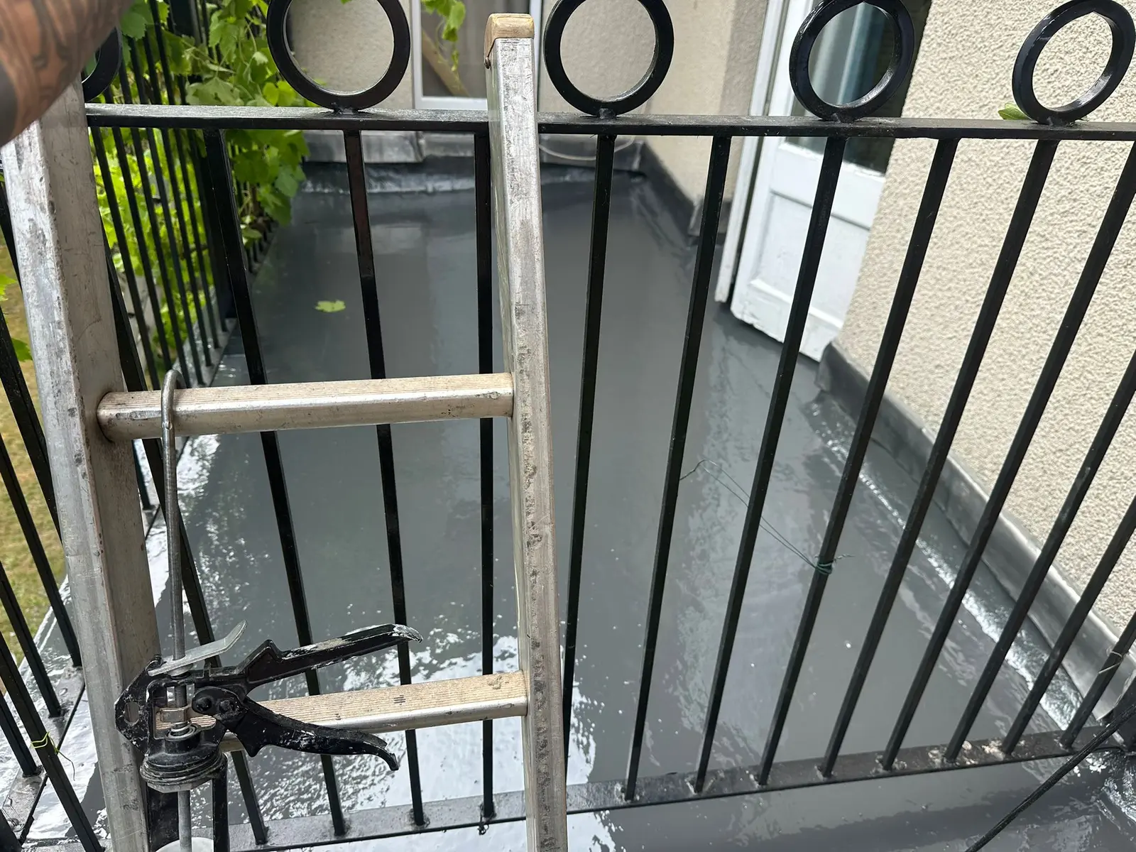 GRP fibreglass balcony with black railings
